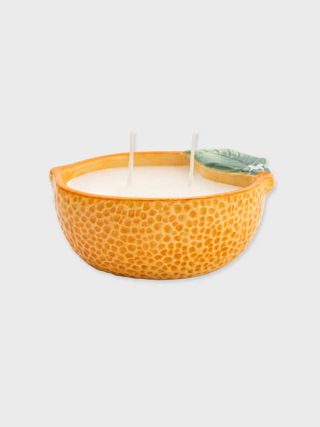 Orange Candle in ceramic pot