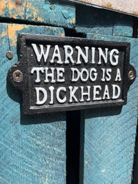 The dog is a dickhead- Cast Iron Sign