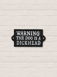 The dog is a dickhead- Cast Iron Sign