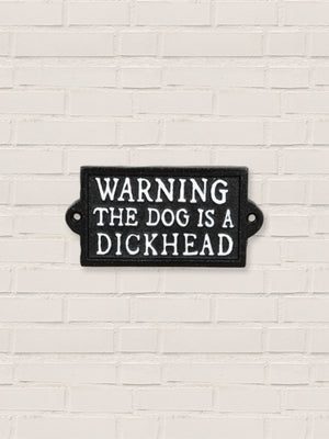 The dog is a dickhead- Cast Iron Sign
